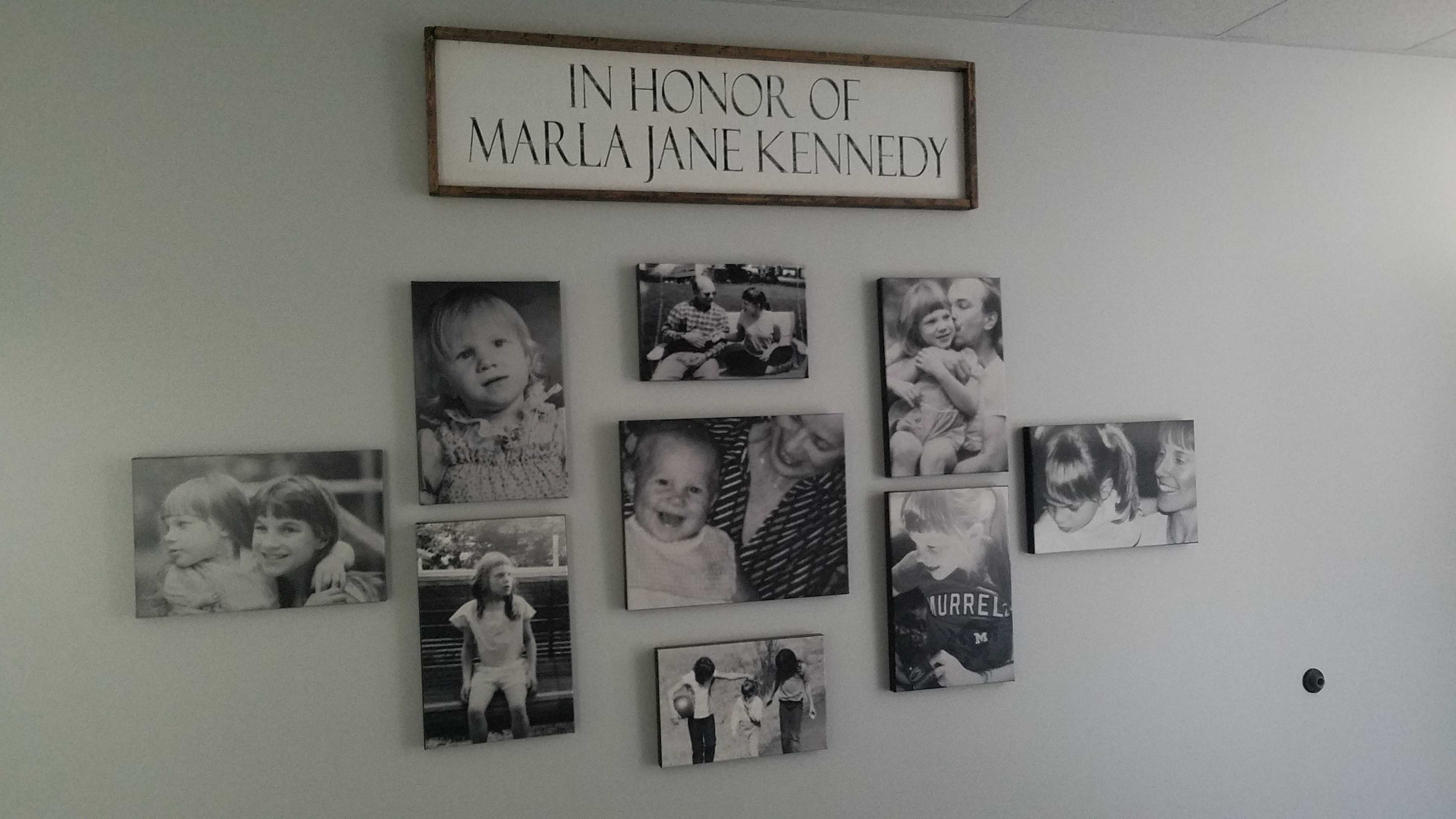 Pictures on wall of Marla Kennedy